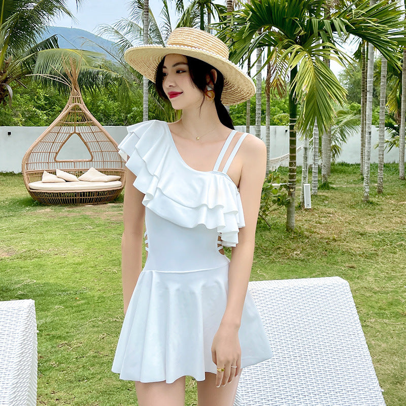 Modest one piece swimwear with skirt for added coverage and confidence