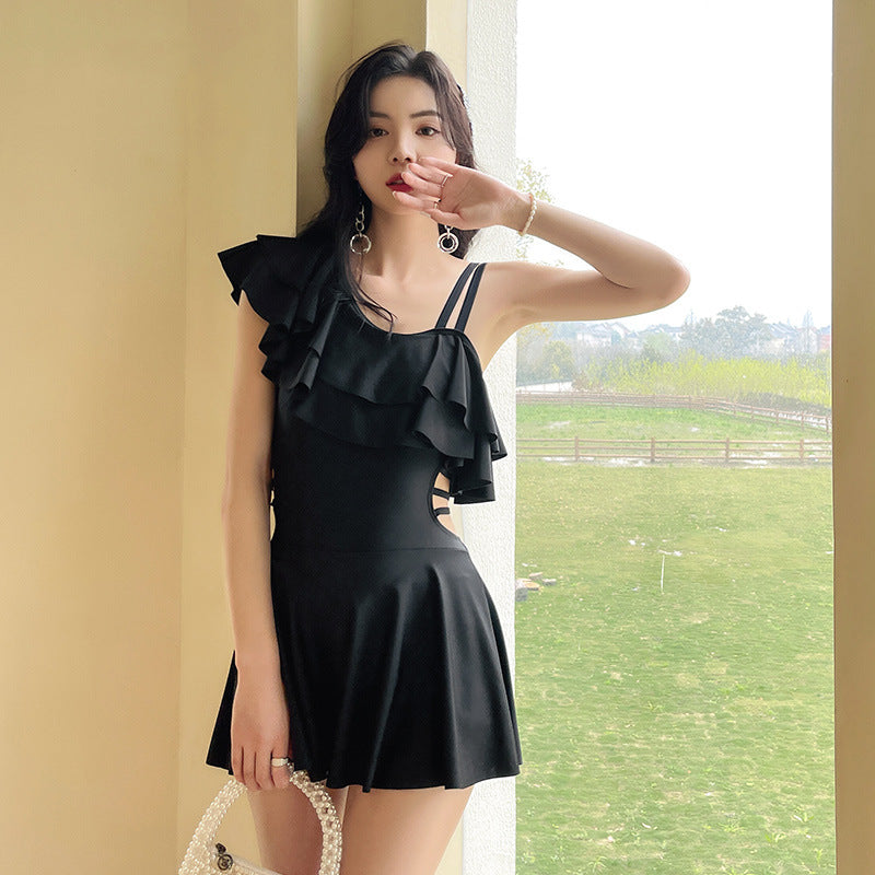 Tummy control swim dress in elegant color designed to shape and smooth the waist