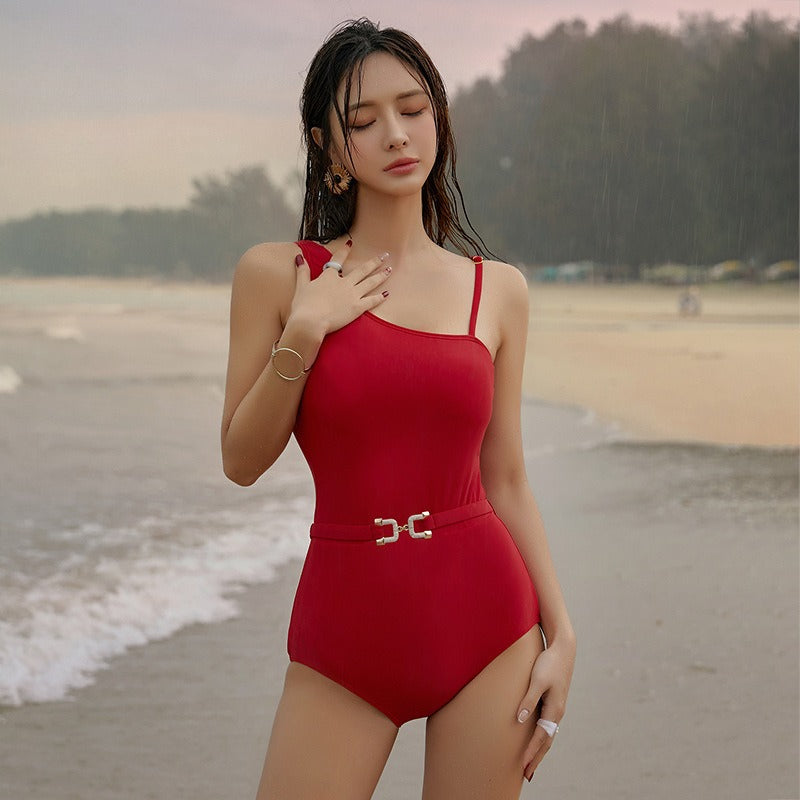 Elegant red one piece swimwear for women with asymmetrical shoulder design